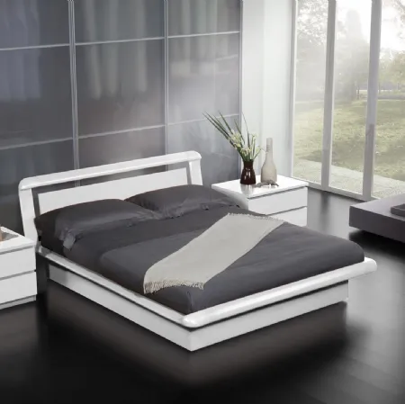 Letto matrimoniale in legno laccato Elica di Fratelli Elli