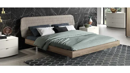 Letto in legno con testiera rivestita in ecopelle trapuntata Dune di Mab
