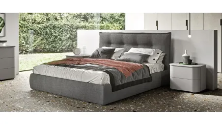 Letto in tessuto con testiera impunturata e contenitore Leggo di Mab