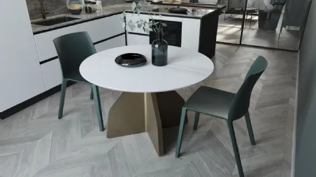 Tavolo rotondo Wing con piano in ceramica bianco con struttura bronzo di Zamagna
